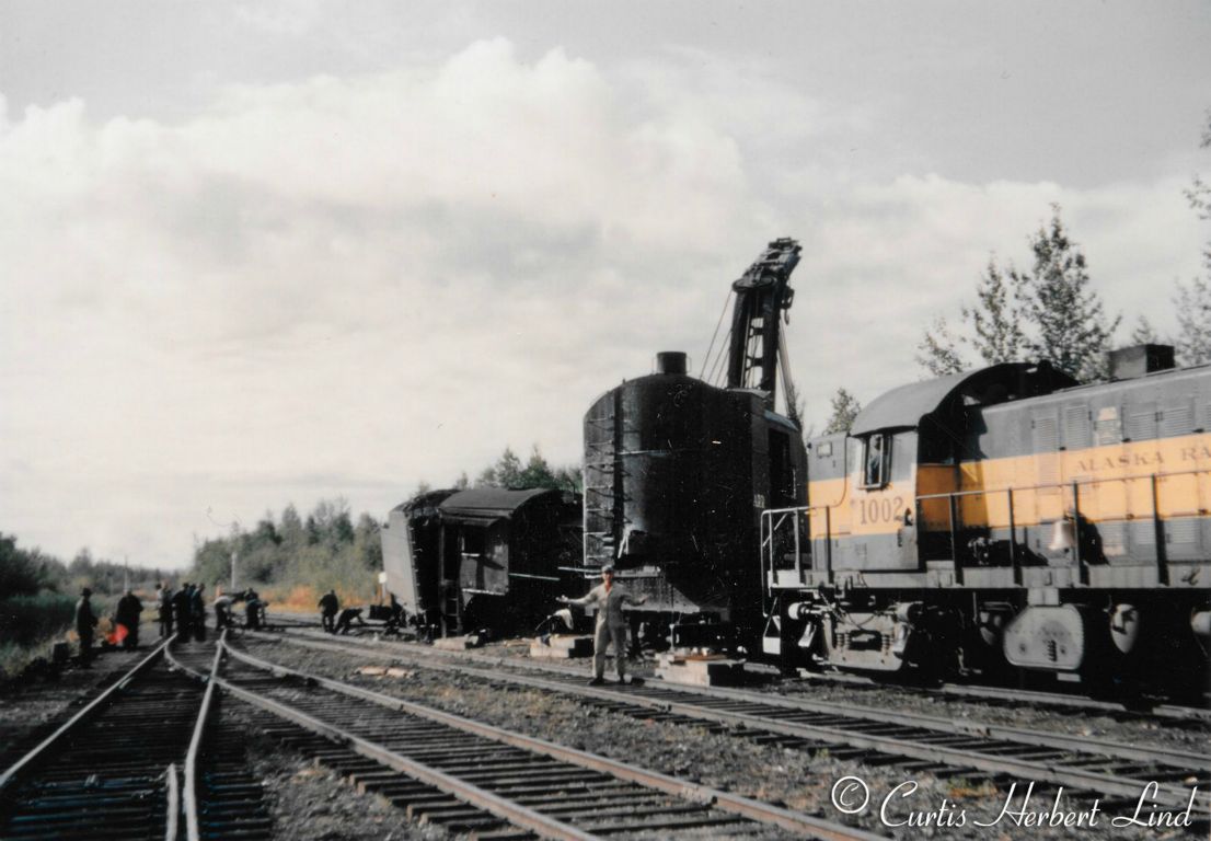 Clean up after the wreck of Locomotive 801 at the South end of the Nenana Yard.