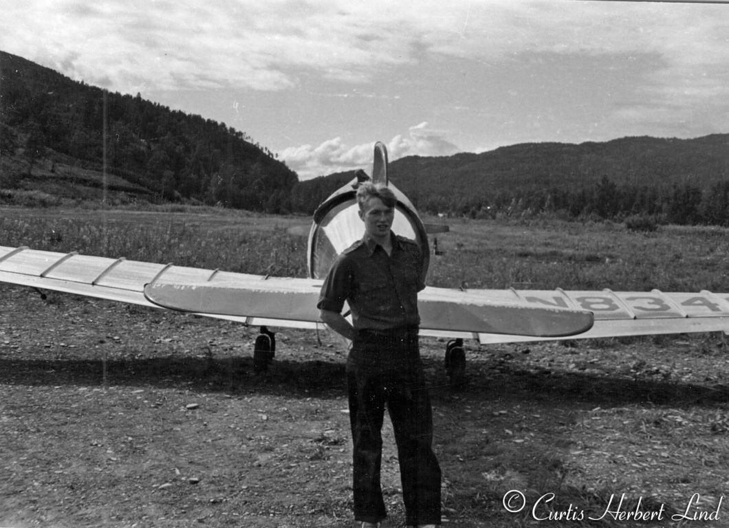 Unidentified tricycle gear airplane. Curt Lind in photo.