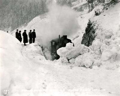 Passengers walking over snow